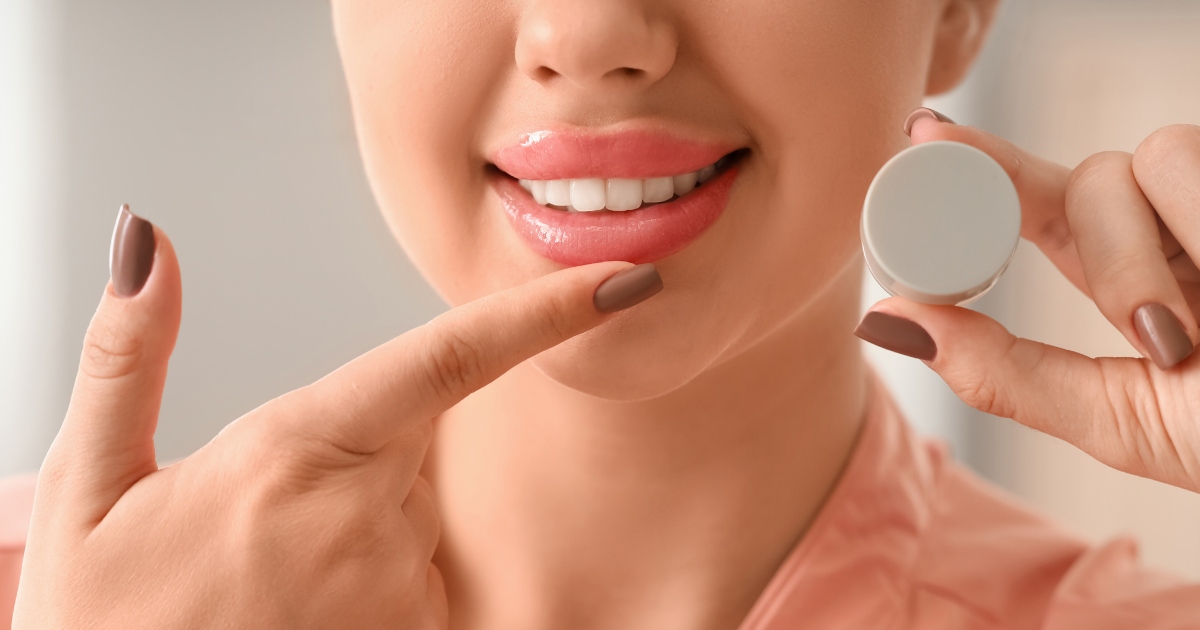 How Long Do Lip Fillers Really Last? (And Why Results Vary So Much) 1 Person with natural-looking, full lips smiling confidently